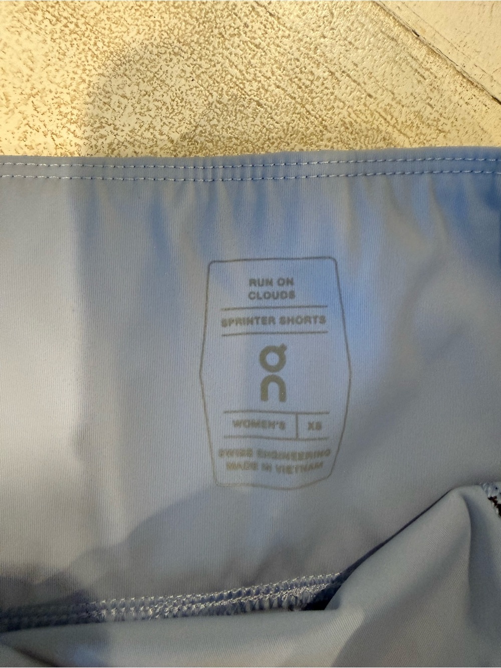 On Running Women’s Light Blue sprinting Shorts with Pockets - Picture 3 of 4